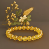 Citrine crystal bracelet made with natural gemstone beads, associated with abundance, positivity, and confidence.